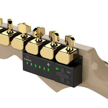 TronicalTune automatic guitar tuner - six-in-line, Gold Strat TronicalTune automatic guitar tuner mounted behind a six-in-line guitar headstock with gold motorized tuning pegs and Strat keys