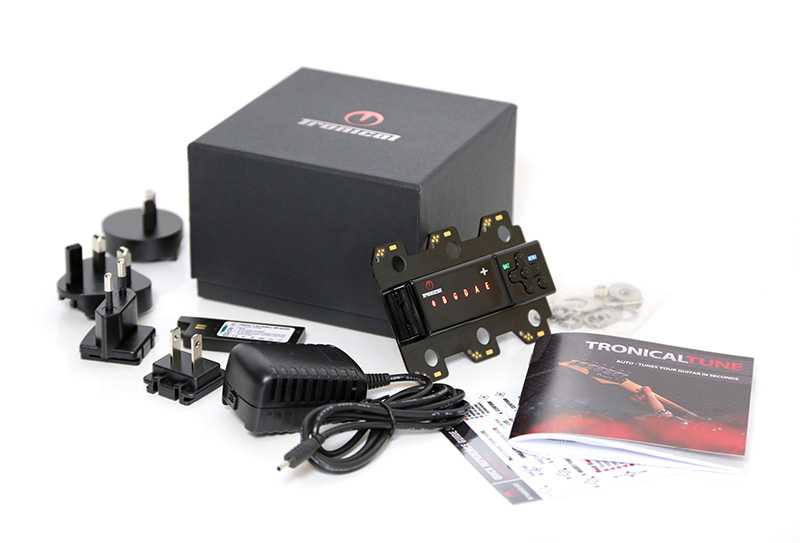TronicalTune guitar tuner electronics and accessories TronicalTune control unit with battery, charging accessories, documentation and packaging
