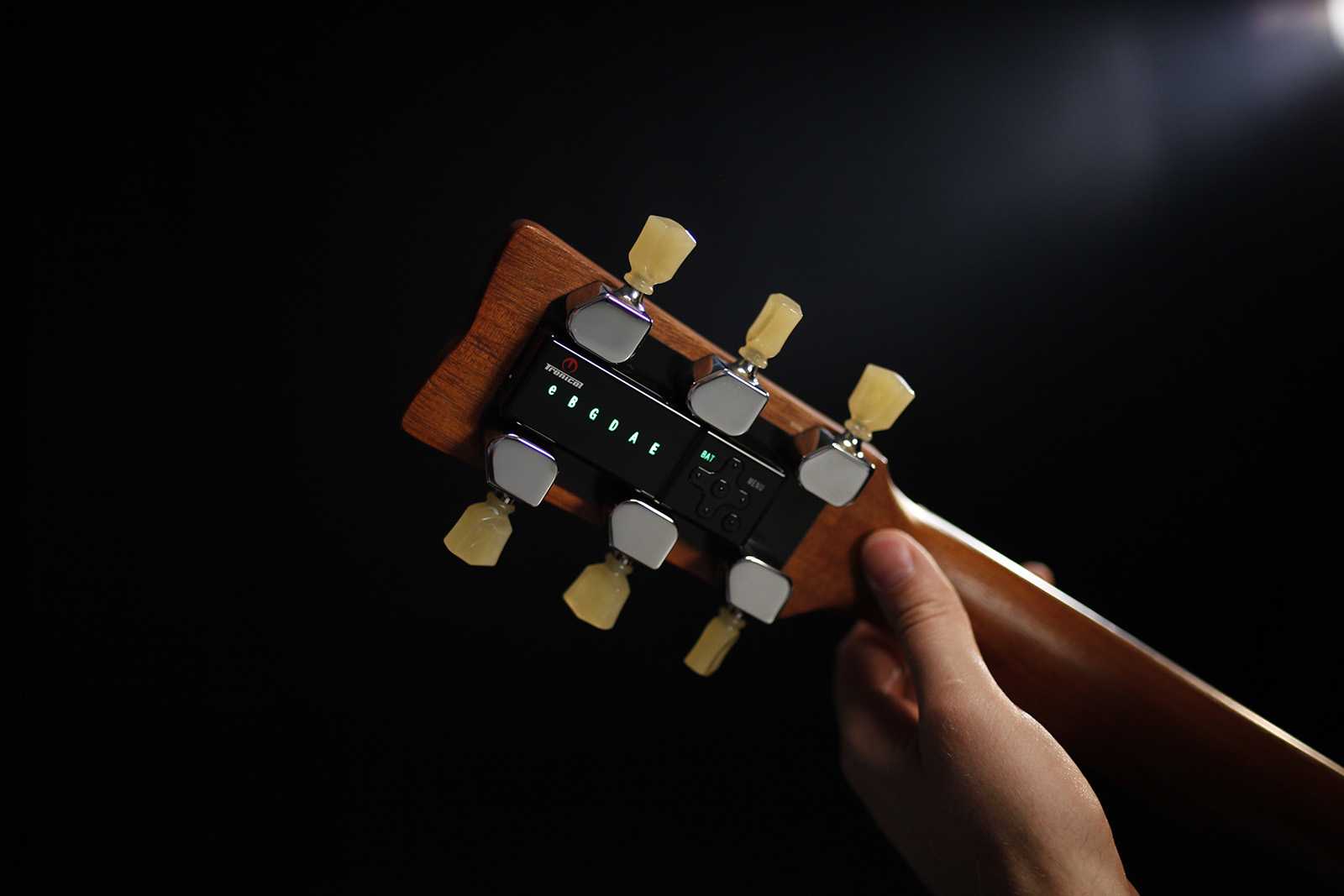 Why Your Capo Pulls the Guitar Sharp Rear headstock with TronicalTune controls for Capo Mode when a capo pulls the guitar sharp