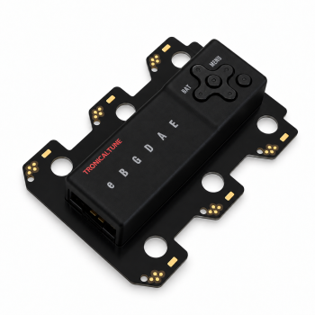 Current TronicalTune PCB with deep black plastic housing and control buttons on white